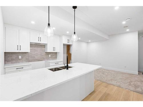 1623 21 Avenue Nw, Calgary, AB - Indoor Photo Showing Kitchen With Double Sink With Upgraded Kitchen