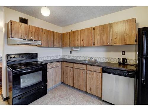 301-1335 12 Avenue Sw, Calgary, AB - Indoor Photo Showing Kitchen