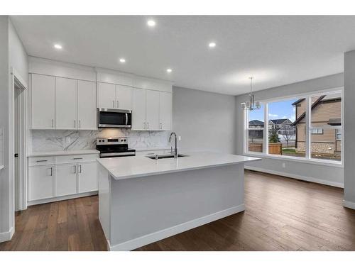 15 Legacy Reach View Se, Calgary, AB - Indoor Photo Showing Kitchen With Upgraded Kitchen