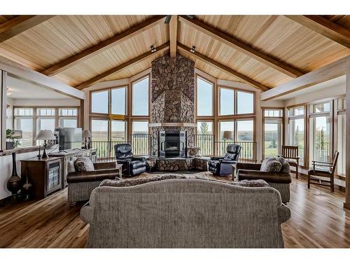 610107 184 Street East, Rural Foothills County, AB - Indoor Photo Showing Living Room With Fireplace