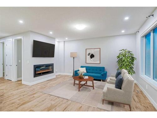 330 Yorkville Road Sw, Calgary, AB - Indoor Photo Showing Living Room With Fireplace