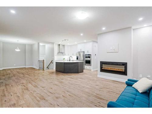 330 Yorkville Road Sw, Calgary, AB - Indoor Photo Showing Other Room With Fireplace