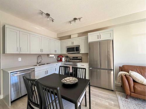 5213-200 Seton Circle Se, Calgary, AB - Indoor Photo Showing Kitchen With Double Sink