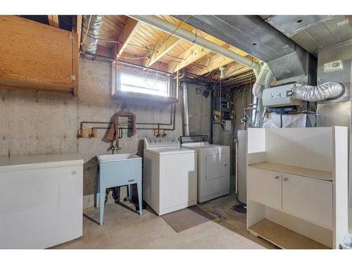 4911 Vantage Crescent Nw, Calgary, AB - Indoor Photo Showing Laundry Room