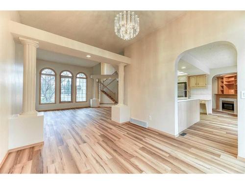 1045 Shawnee Drive Sw, Calgary, AB - Indoor Photo Showing Other Room With Fireplace