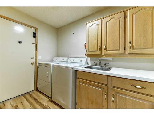 1045 Shawnee Drive Sw, Calgary, AB - Indoor Photo Showing Laundry Room