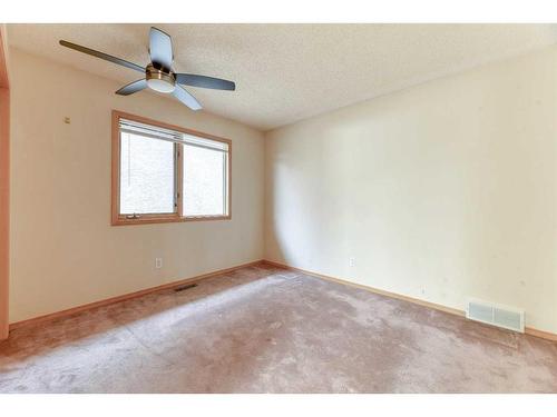 1045 Shawnee Drive Sw, Calgary, AB - Indoor Photo Showing Other Room