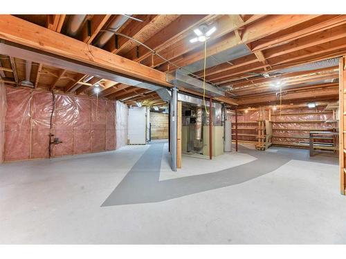 1045 Shawnee Drive Sw, Calgary, AB - Indoor Photo Showing Basement