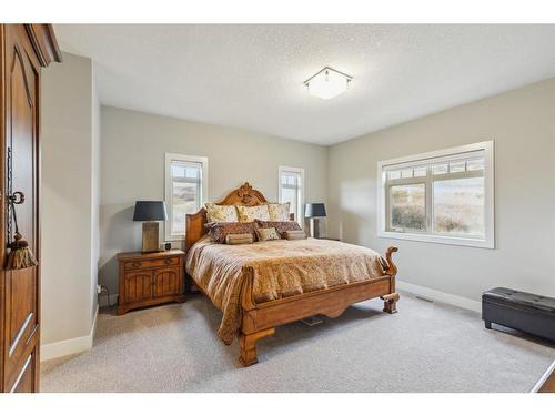 354015 Meridian Street, Rural Foothills County, AB - Indoor Photo Showing Bedroom