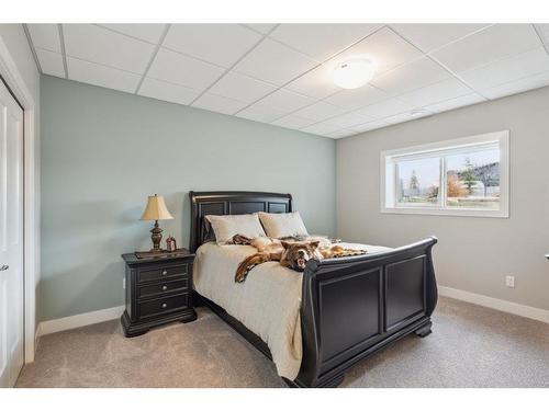 354015 Meridian Street, Rural Foothills County, AB - Indoor Photo Showing Bedroom