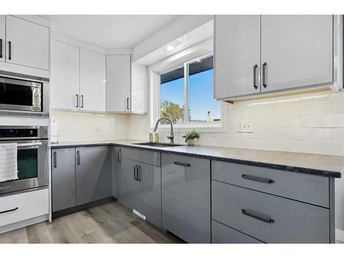 56 Woodfern Way Sw, Calgary, AB - Indoor Photo Showing Kitchen