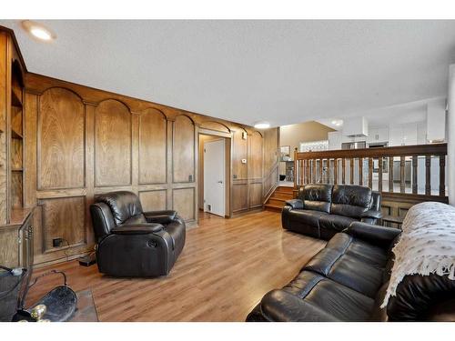 56 Woodfern Way Sw, Calgary, AB - Indoor Photo Showing Living Room