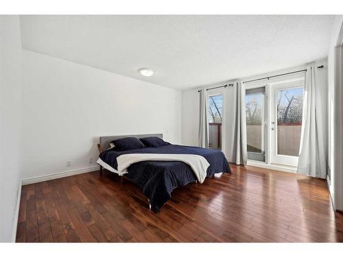 56 Woodfern Way Sw, Calgary, AB - Indoor Photo Showing Bedroom