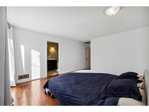 56 Woodfern Way Sw, Calgary, AB - Indoor Photo Showing Bedroom