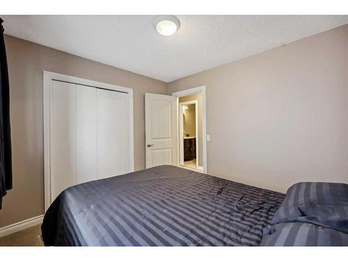 56 Woodfern Way Sw, Calgary, AB - Indoor Photo Showing Bedroom