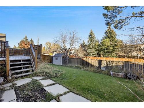 56 Woodfern Way Sw, Calgary, AB - Outdoor With Backyard