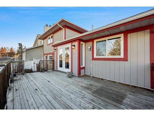 56 Woodfern Way Sw, Calgary, AB - Outdoor With Deck Patio Veranda With Exterior