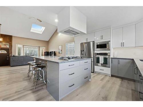 56 Woodfern Way Sw, Calgary, AB - Indoor Photo Showing Kitchen With Stainless Steel Kitchen With Upgraded Kitchen