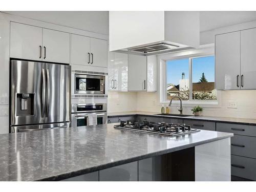 56 Woodfern Way Sw, Calgary, AB - Indoor Photo Showing Kitchen With Stainless Steel Kitchen With Upgraded Kitchen