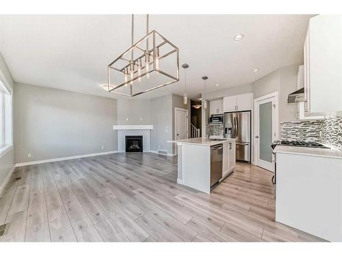 48 Nolanhurst Crescent Nw, Calgary, AB - Indoor Photo Showing Kitchen With Fireplace