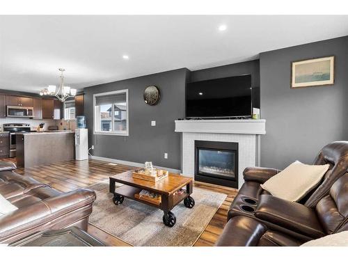 2 Violet Close, Olds, AB - Indoor Photo Showing Living Room With Fireplace