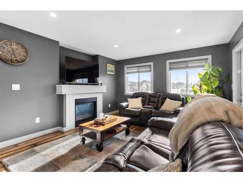 2 Violet Close, Olds, AB - Indoor Photo Showing Living Room With Fireplace