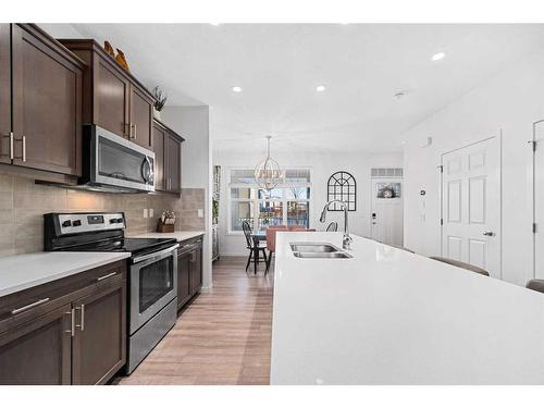 258 Vista Drive, Crossfield, AB - Indoor Photo Showing Kitchen With Stainless Steel Kitchen With Double Sink With Upgraded Kitchen