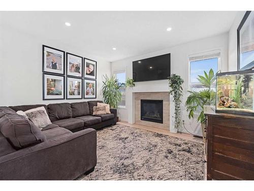 258 Vista Drive, Crossfield, AB - Indoor Photo Showing Living Room With Fireplace