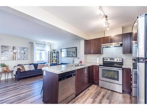 107 Pantego Lane Nw, Calgary, AB - Indoor Photo Showing Kitchen With Stainless Steel Kitchen