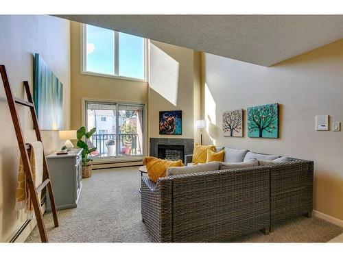 731-6400 Coach Hill Road Sw, Calgary, AB - Indoor With Fireplace