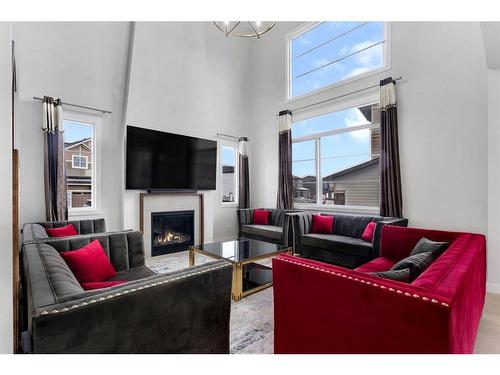 29 South Shore Manor, Chestermere, AB - Indoor Photo Showing Living Room With Fireplace