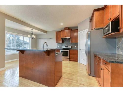 144 Cove Rise, Chestermere, AB - Indoor Photo Showing Kitchen