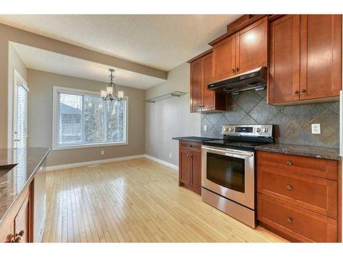 144 Cove Rise, Chestermere, AB - Indoor Photo Showing Kitchen