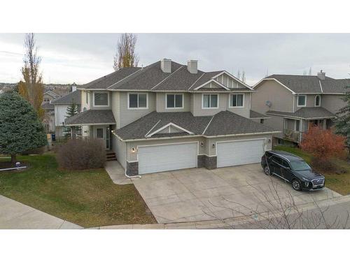 144 Cove Rise, Chestermere, AB - Outdoor With Facade