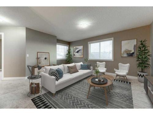 144 Cove Rise, Chestermere, AB - Indoor Photo Showing Living Room