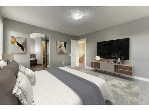 144 Cove Rise, Chestermere, AB - Indoor Photo Showing Bedroom