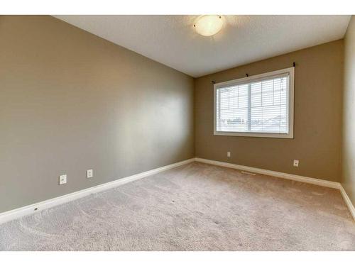 144 Cove Rise, Chestermere, AB - Indoor Photo Showing Other Room