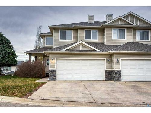 144 Cove Rise, Chestermere, AB - Outdoor With Facade