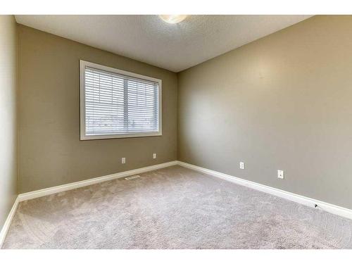 144 Cove Rise, Chestermere, AB - Indoor Photo Showing Other Room