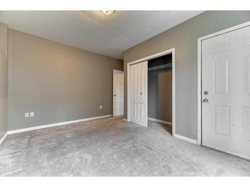 144 Cove Rise, Chestermere, AB - Indoor Photo Showing Other Room