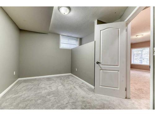 144 Cove Rise, Chestermere, AB - Indoor Photo Showing Other Room