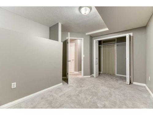 144 Cove Rise, Chestermere, AB - Indoor Photo Showing Other Room