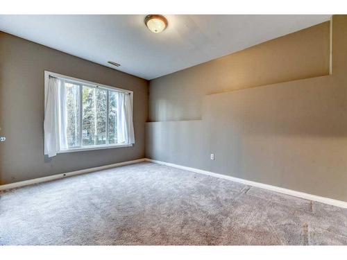 144 Cove Rise, Chestermere, AB - Indoor Photo Showing Other Room