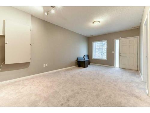 144 Cove Rise, Chestermere, AB - Indoor Photo Showing Other Room