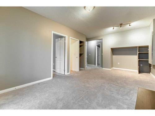 144 Cove Rise, Chestermere, AB - Indoor Photo Showing Other Room