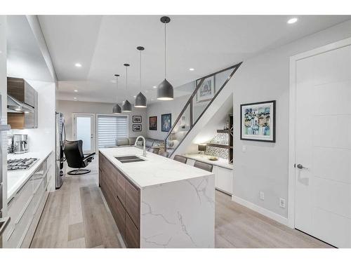 2-2605 15 Street Sw, Calgary, AB - Indoor Photo Showing Kitchen With Double Sink With Upgraded Kitchen