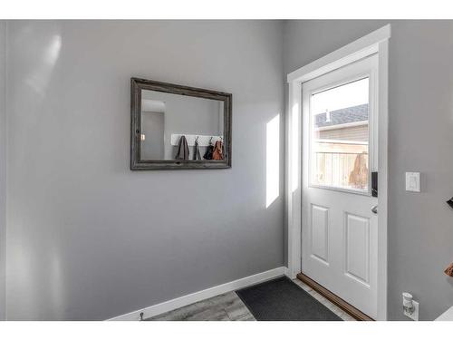 13 Willow Green Way, Cochrane, AB - Indoor Photo Showing Other Room