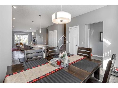 13 Willow Green Way, Cochrane, AB - Indoor Photo Showing Dining Room