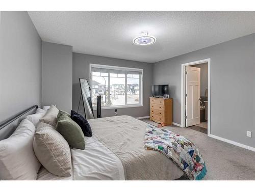 13 Willow Green Way, Cochrane, AB - Indoor Photo Showing Bedroom