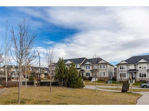 13 Willow Green Way, Cochrane, AB - Outdoor With Facade